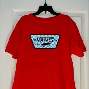 Red vans shirt sleeved t-shirt with blue and white checkered logo. Worn once.